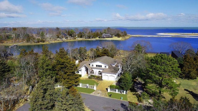 birds eye view of property featuring a water view