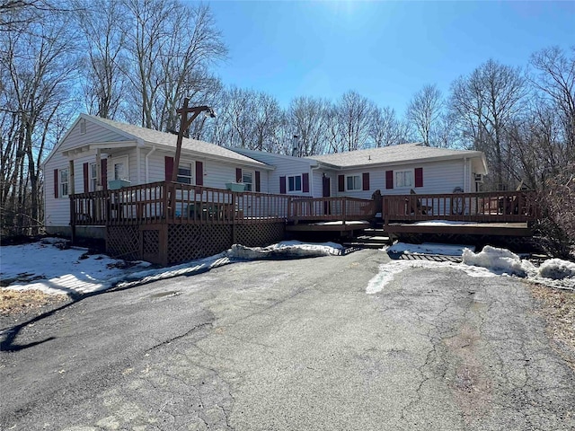 view of front of house featuring a deck