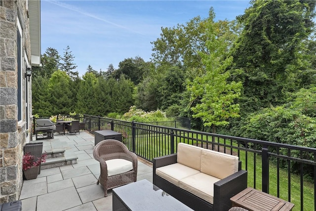 view of patio with outdoor lounge area, area for grilling, and outdoor dining space