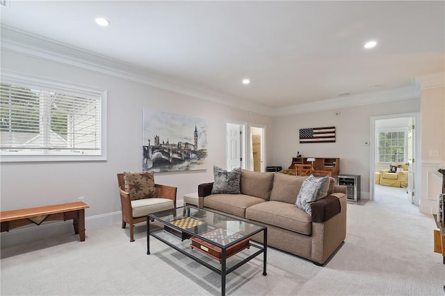 living room with recessed lighting, light colored carpet, crown molding, and baseboards