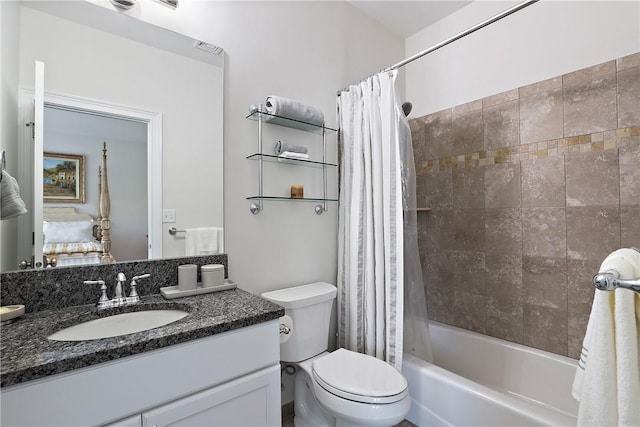 full bathroom with toilet, shower / bathtub combination with curtain, and vanity