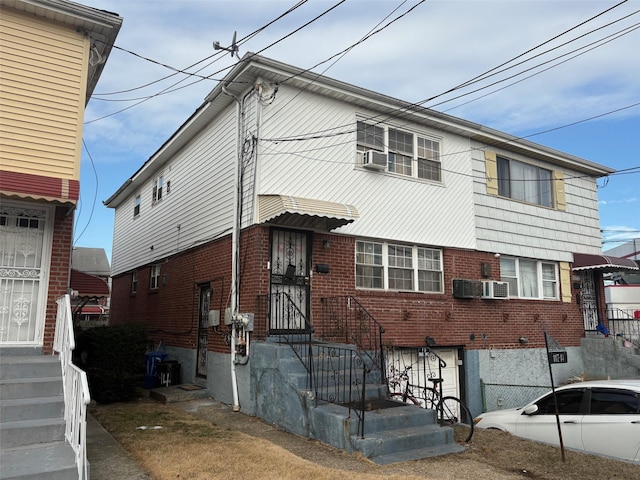 view of front facade with brick siding