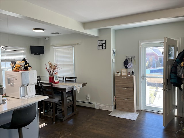 dining space featuring beamed ceiling, dark wood-style flooring, visible vents, and baseboards