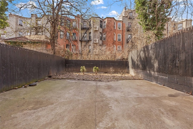 view of patio featuring a fenced backyard