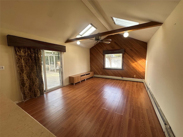 bonus room featuring beam ceiling, a skylight, wood finished floors, and a baseboard radiator