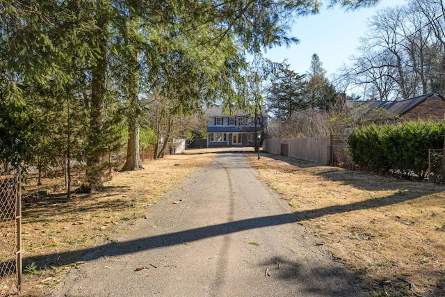 view of road featuring aphalt driveway