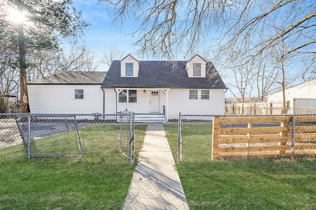 cape cod house with roof with shingles, a fenced front yard, and a front yard