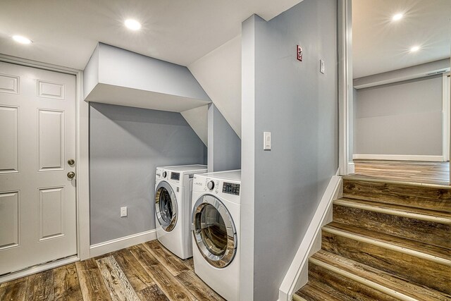 laundry area featuring washer and dryer, laundry area, recessed lighting, and wood finished floors