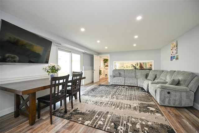 living room featuring recessed lighting and wood finished floors