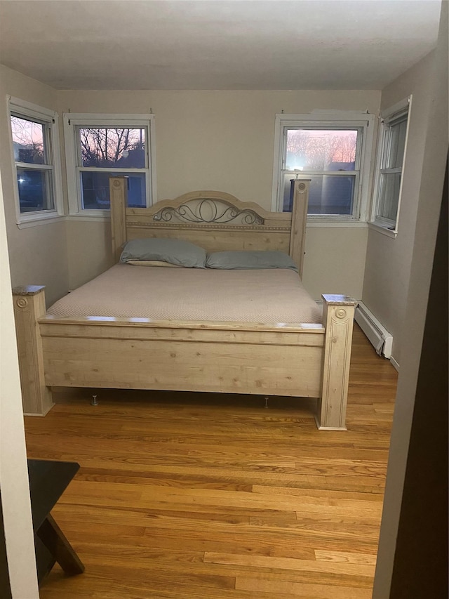 bedroom with light wood-style floors