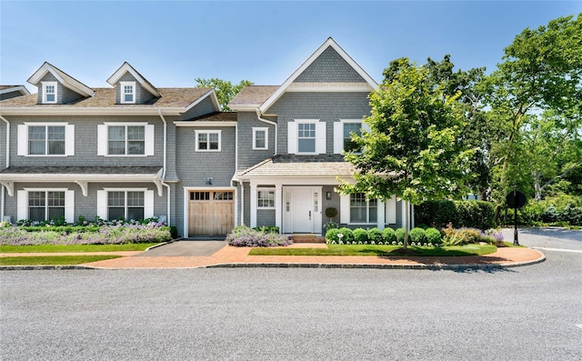 view of front of house featuring a garage and concrete driveway