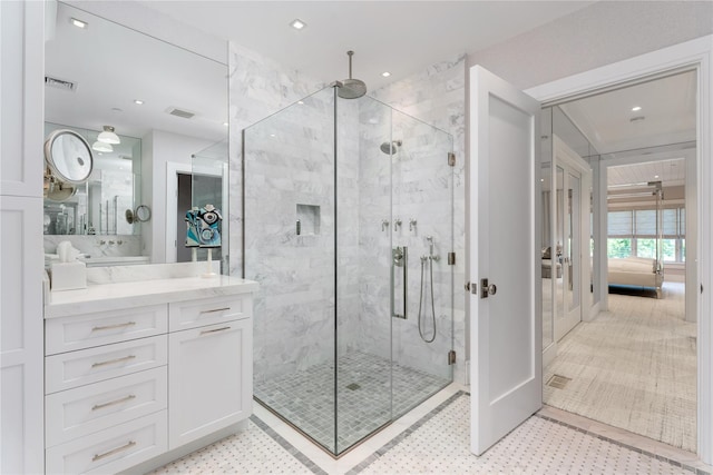 ensuite bathroom with visible vents, ensuite bath, vanity, a shower stall, and recessed lighting