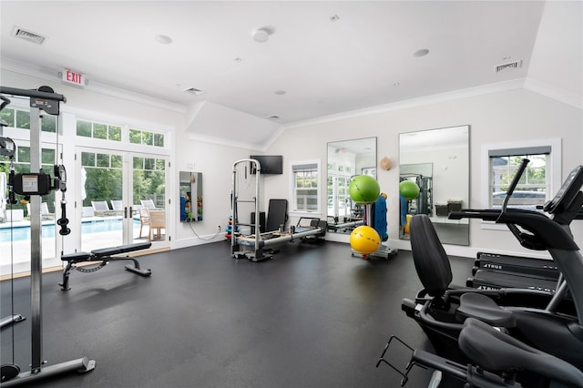 workout area with lofted ceiling, visible vents, crown molding, and french doors