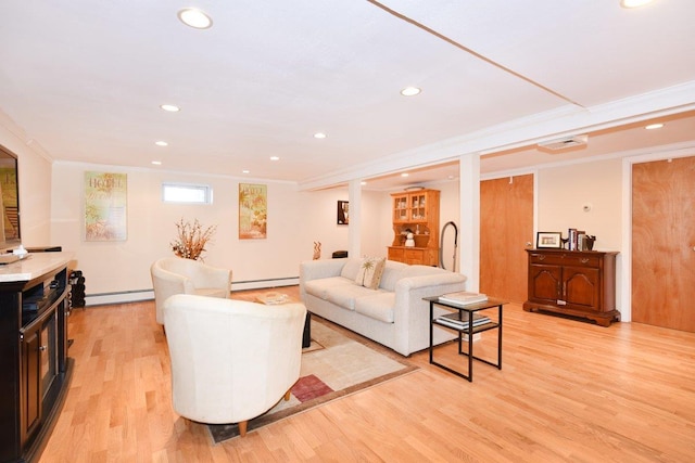 living area with light wood-type flooring, a baseboard radiator, ornamental molding, and recessed lighting