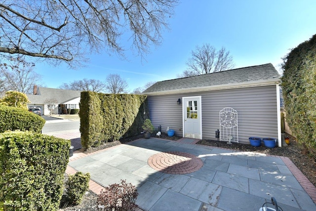 exterior space with an outbuilding