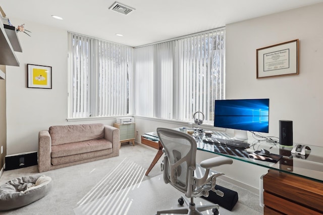 office area featuring visible vents and carpet floors