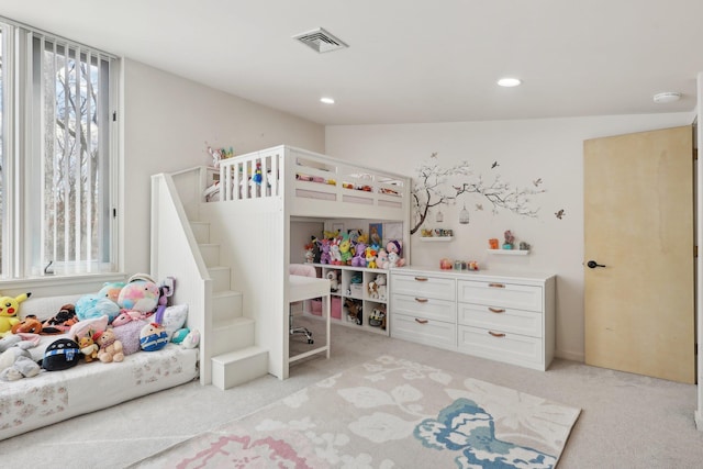 bedroom with recessed lighting, visible vents, and light carpet