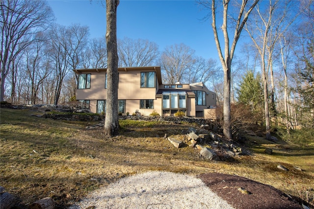 view of front of house featuring stucco siding