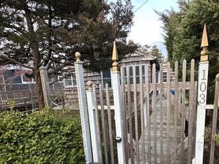 view of gate with fence