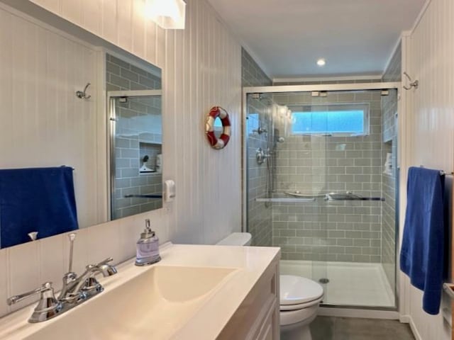 103 Greene Walk, Cherry Grove, NY 11782 - bathroom featuring toilet, vanity, and a stall shower