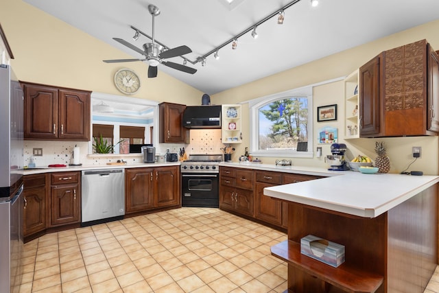 kitchen with tasteful backsplash, open shelves, stainless steel appliances, and lofted ceiling