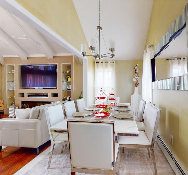 dining space featuring a baseboard heating unit, built in shelves, a notable chandelier, and vaulted ceiling with beams