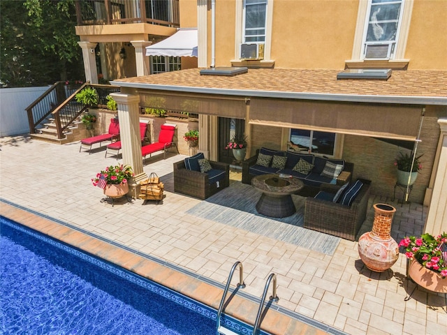 view of patio with cooling unit and an outdoor hangout area