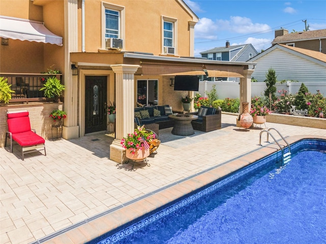 back of house featuring stucco siding, a patio, an outdoor living space, and fence