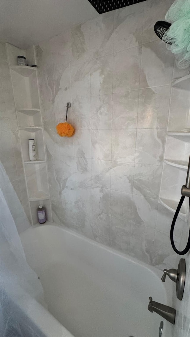 bathroom with shower / bathing tub combination