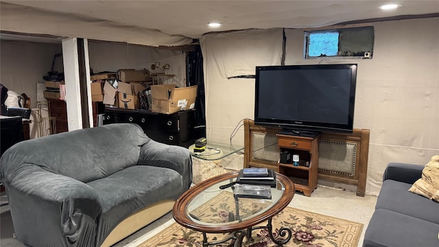 living room featuring concrete floors and recessed lighting