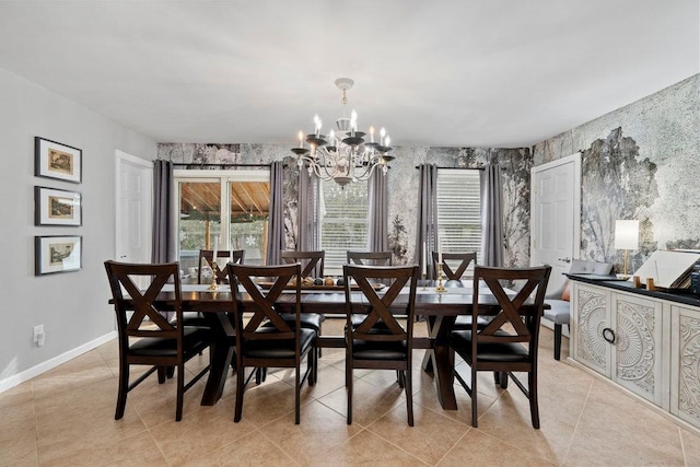 dining area with a chandelier, wallpapered walls, light tile patterned floors, and baseboards