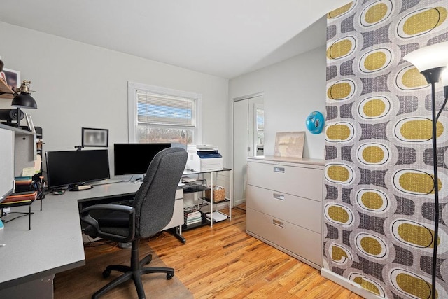 home office featuring light wood-style flooring