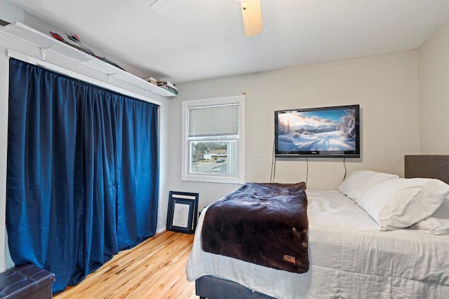 bedroom with wood finished floors