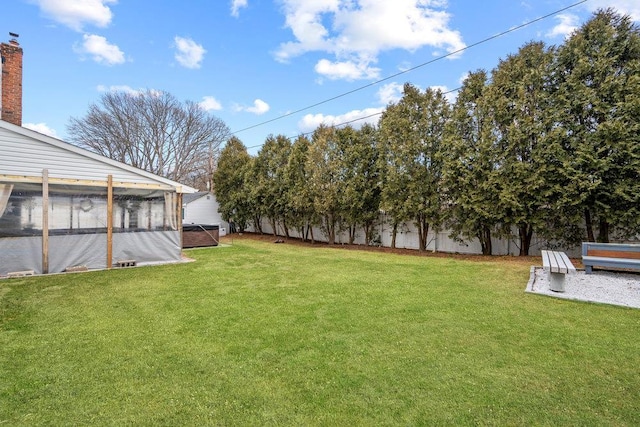 view of yard featuring a fenced backyard