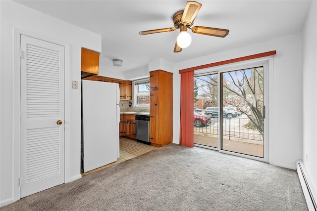 interior space featuring a baseboard radiator, a sink, a ceiling fan, and light colored carpet