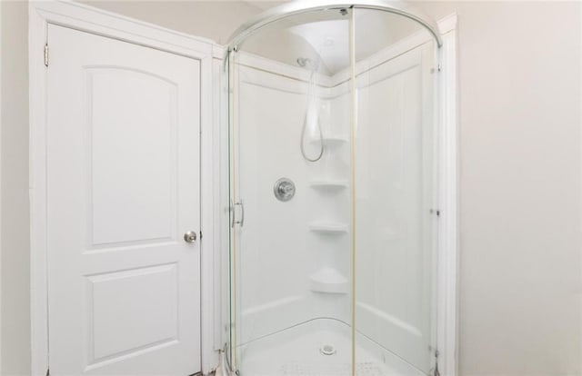 full bath featuring a stall shower