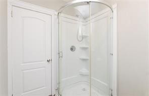 full bathroom with a stall shower