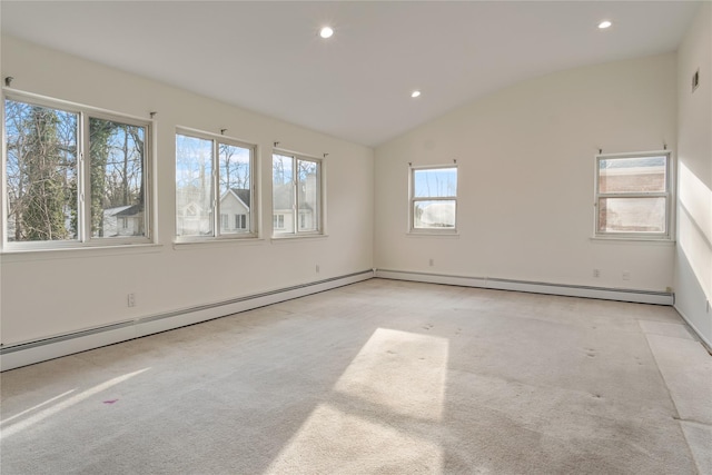 empty room featuring lofted ceiling, a baseboard heating unit, carpet, and recessed lighting