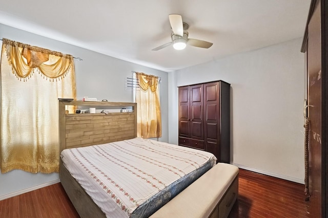 bedroom with wood finished floors and a ceiling fan