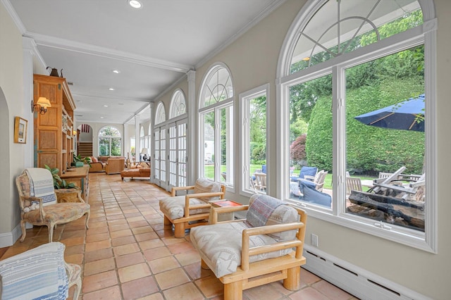 2 Aspen Pl, Great Neck, NY 11021 - sunroom / solarium featuring baseboard heating, crown molding, french doors, recessed lighting, and tile patterned floors