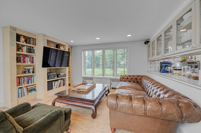 2 Aspen Pl, Great Neck, NY 11021 - living area featuring radiator and recessed lighting