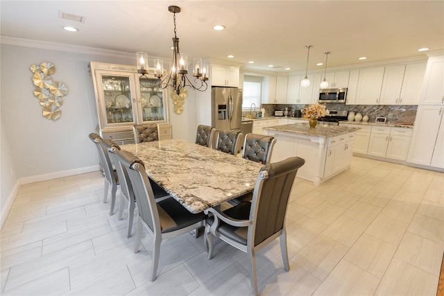 dining space with ornamental molding, recessed lighting, visible vents, and baseboards