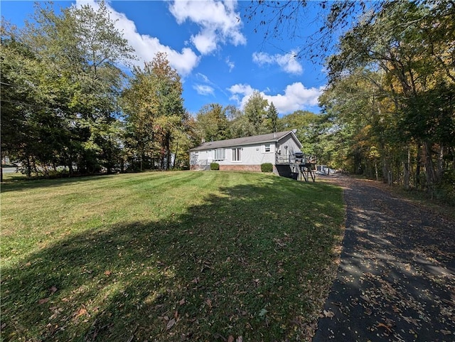 exterior space featuring a front yard