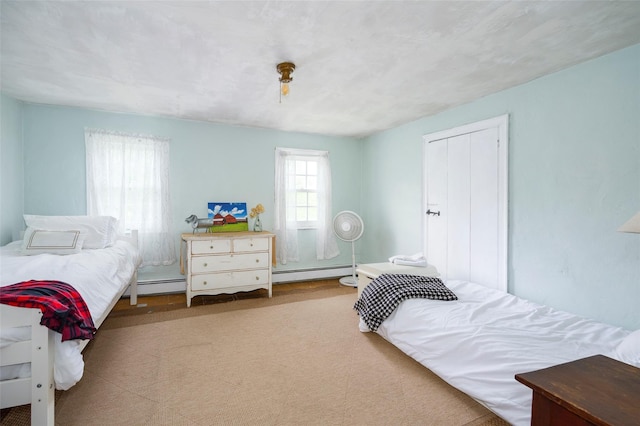 148 N Creek Rd, Staatsburg, NY 12580 - bedroom with baseboard heating and carpet