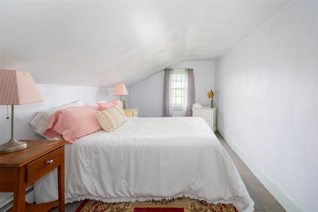148 N Creek Rd, Staatsburg, NY 12580 - bedroom with vaulted ceiling, baseboards, and wood finished floors