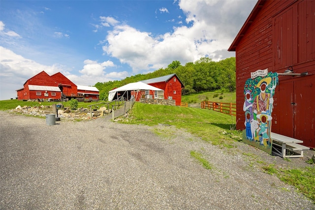 148 N Creek Rd, Staatsburg, NY 12580 - view of yard with fence, an outbuilding, and driveway