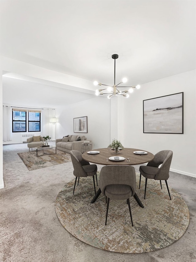 10 Franklin Ave Unit 2F, White Plains, NY 10601 - dining area featuring a chandelier and carpet
