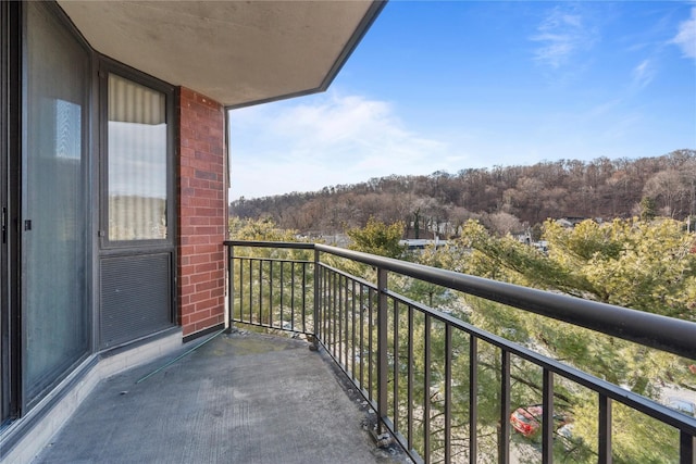 balcony with a forest view