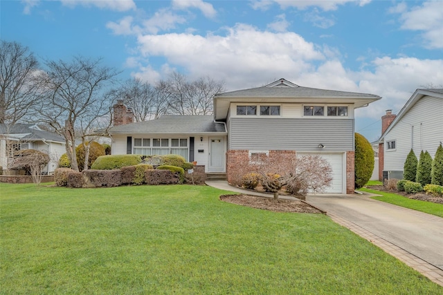 split level home with a garage, driveway, brick siding, and a front yard