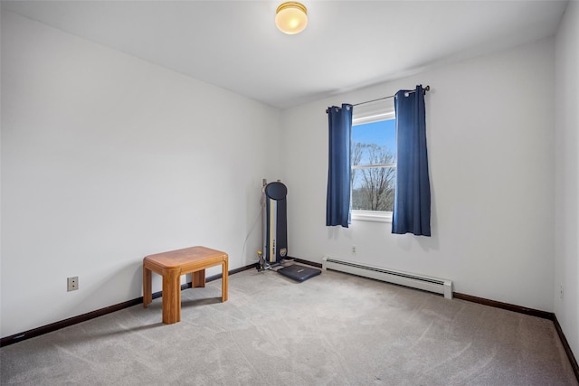 exercise room featuring baseboards, carpet, and a baseboard radiator